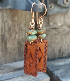 Brown Stamped Copper Jewelry, Artisan Stamped Brown Jewelry, Adjustable Nickel-free Rust-colored Jewelry, Adjustable Rust-colored Nickel-free Jewelry, Bohemian Stamped Dangle Jewelry, Rustic Rust Jewelry With Patina, Artisan Hand Tooled Drop Earrings, Artisan Hand-tooled Drop Earrings, Adjustable Stamped Dangle Earrings