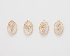 Item Details measurement: 10x14mm Material: Brass, Pearl Color: 14K Polished Gold Plated Quantity: 1 Piece , 12 Pieces Country of Origin : South Korea **Birth Month Flowers** January: Carnation February: Iris March: Daffodil April: Daisy May: Lily of the Valley June: Rose July: Water Lily August: Poppy September: Aster October: Marigold November: Chrysanthemum December: Poinsettia July Water Lily, Flowers January, May Lily Of The Valley, September Aster, August Poppy, January Carnation, Daisy May, Round Locket, Month Flowers