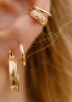 Get the look of a cartilage hoop, no piercing required. These ear cuffs are designed with the perfect amount of thickness and comfort so you can wear them every day - quite literally you never have to take them off. They can be worn in the shower + while you sleep. Simply slide onto the conch part of your ear and go. Wear one for a minimal look or grab a pair for stacking. Cartilage Hoop, Minimal Look, Ear Cuffs, The Shower, Conch, Get The Look, Ear Cuff, You Never, Every Day