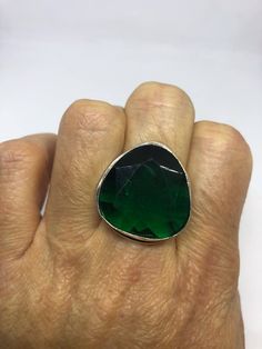 Large brilliant emerald green antique glass Ornate German Silver NOT 925 Vintage ring, does not tarnish Size 7 can be re sized, my jeweler charges a $10 - $15 fee All rings are shipped free in the US in a nice gift box. Check out our over a THOUSAND great reviews Engraving is $4 per letter and is not always perfect depending on the piece. It can take a few days if the jeweler is busy. This is payable to Paypal Judithsltd@gmail.com Unique Green Emerald Ring For Formal Occasions, Classic Green Emerald Ring Stamped 925, Green Nickel-free Ring As Gift, Classic Green Jewelry With Vs Clarity, Emerald Faceted Ring As A Gift, Nickel Free Green Ring As A Gift, Handmade Green Rings For Formal Occasions, Green Handmade Rings For Formal Occasions, Green Rings For Jewelry Making May Birthstone