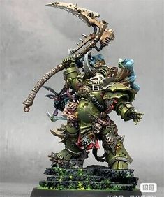 a warhammer is holding a large metal object in one hand and an arm on the other