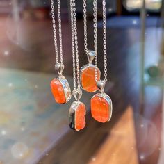 Chain Length: Adjustable 16" or 18" Gemstone Size: .25-.38" Long x .25" Wide KEY WORDS: Ambition, Energy, Action Carnelian embodies the fiery nature of our being; the passion, motivation, and desire we often stifle. This stone ignites the hearth of your soul, also known as the solar plexus, to create sparks of curiosity and ambition. It also opens the root chakra, backing up inspiration with the physical energy to pursue it. Beyond passions, Carnelian overall brings life force energy into the bo Luxury Orange Spiritual Necklaces, Everyday Spiritual Orange Jewelry, Orange Pendant Necklace With Birthstone, Orange Birthstone Pendant Necklace, Spiritual Carnelian Gemstone Crystal Necklace, Spiritual Carnelian Crystal Necklace, Orange Gemstone Crystal Necklace For Gift, Orange Crystal Gemstone Necklace For Gift, Amber Sterling Silver Necklace For Healing