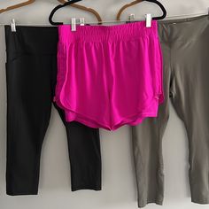 Avia Bundle Of Two Pair Leggings -Euc And One Pair Shorts Nwt All Size Medium Bright Magenta Pink Shorts Have An Elastic Waistband 5” Inseam Nike Shorts Lining Semi Fitted Double Layer Side Pocket On Knee Short Moisture Wicking Toggle Cinch On Both Sides To Adjust Gathering Photos Show With It Loose Or Gathered Tag Calls These Purple But They Are More Pink Than Purple Black Leggings Have Side Slip Pockets High Waisted Approx Measurements Inseam 18” Rise 10.5” Olive Green Leggings Have A Small Zi Pink Stretch Short Pants, Pink Activewear Shorts With Pockets, Pink Activewear With Pockets For Spring, Pink Short Activewear With Pockets, Spring Pink Activewear With Pockets, High Waist Pink Activewear With Elastic Waistband, Pink Stretch Shorts With Pockets, Casual Pink Pants With Built-in Shorts, Pink Activewear With Pockets For Loungewear