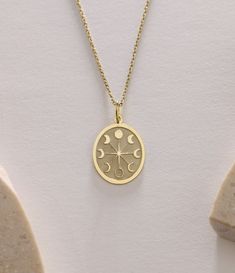 Gold Moon Pendant - Moon Phases Gold Necklace ● Material of pendant: Solid Gold 14k ( REAL GOLD ) ● Metal Stamp: 14k ( REAL GOLD ) ● The pendant is available in 5 sizes: - 12x17 mm / 0,47 x 0,66 inches - 13x18 mm / 0,51 x 0,70 inches  In the photos - 14x19 mm / 0,55 x 0,74 inches  - 16x21 mm / 0,62 x 0,82 inches  - 18x24 mm / 0,70 x 0,94 inches ( In the photos the size is 13x18 mm / 0,51 x 0,70 inches ) ( Jump Ring inner diameter: 4 mm ) ● Material of chain: Solid gold 14k ( REAL GOLD ) It is thin and dainty and it is available in 4 sizes: - 40 cm / 15,75 inches ( Length ) - 45 cm / 17,72 inches ( Length ) In the photos - 50 cm / 19,68 inches ( Length ) - 55 cm / 21,65 inches ( Length ) ● Backside engraving is FREE ( Please use the personalization box for that.) ● If you want larger size, Moon Phase Necklace, Gold Engraved Moon-shaped Jewelry, Gold Moon-shaped Engraved Jewelry, Celestial Yellow Gold Charm Necklaces With Moon Phase, Celestial Yellow Gold Moon Phase Charm Necklaces, Celestial Style Moon Charm Necklace For Anniversary, 14k Gold Moon Charm Necklace, Gold Moon-shaped Engraved Necklace, Symbolic 14k Gold Necklace With Moon Charm