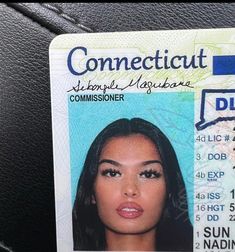 an id card with a woman's face on it