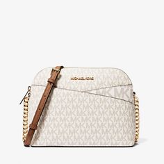 New With Tags 100% Authentic Michael Kors Jet Set Travel Medium Logo Dome Crossbody Bag Vanilla With Gold Tone Hardware Style # 35f1gtvc6b This Crossbody Bag Boasts Signature Appeal In Logo-Print Canvas That’s Accented With Top-Stitch Detailing. Rendered In A Structured Dome Shape, It Features An Adjustable Chain-Trimmed Strap And A Convenient Back Slip Pocket. Logo-Print Canvas 89.4% Coated Canvas/9.6% Polyester /1% Polyurethane Exterior Details: Back Slip Pocket Interior Details: Back Zip Pock Beige Logo Crossbody Shoulder Bag, Beige Logo Shoulder Bag Crossbody, Beige Logo Crossbody Bag, Bag Logo, Travel Crossbody, Exterior Details, White Purses, Media Logo, Bags Logo