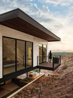 the instagram page shows an image of a small house on top of a hill