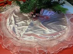 a christmas tree skirt on top of a table