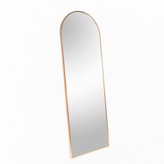 an oval shaped mirror is shown against a white background