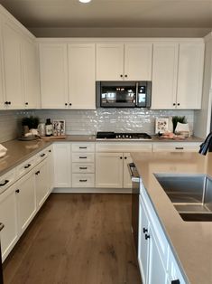 the kitchen is clean and ready for us to use it's new counter tops