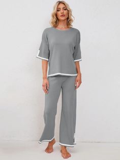 Elevate your comfort with the Classy Elastic Knit Lounge Set, designed for comfort and effortless style. Whether you’re lounging at home or stepping out for casual outings, this set combines comfort with a sleek design, making it a versatile addition to your wardrobe. One of Oprah's Favorite Loungewear Eye-Catching Knitted Style Loungewear! Featuring a crewneck knit crop top and high rise loose knit pants for a cool look, made with a super-soft knit fabric, our Classy Elastic Knit Lounge Set is