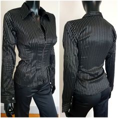 Vintage beautiful black fitted shirt with front zipper.Size Medium (EU) FR.The shirt is stretchy. 70% viscose 25%polyester 5%elastane In excellent vintage condition. For any questions,contact me please Thank you for visiting and purchase Trendy Black Formal Shirt, Sleek Black Slim Fit Tops, Fitted Black Office Shirt, Fitted Black Shirt For Office, Fitted Business Blouse For Fall, Black Fitted Business Tops, Black Stretch Formal Shirt, Formal Black Stretch Shirt, Black Stretch Shirt For Formal Occasions