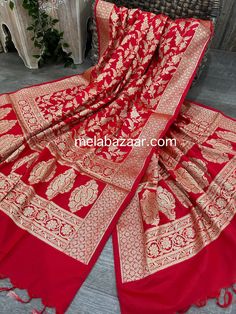 Banarsi red Dupatta with gold zari jaal. Size: 98 inches by 35 inches Fabric: Katan Silk Blend Red Cutdana Shawl For Festivals, Red Jamawar Pashmina Shawl For Wedding, Red Pashmina Shawl With Traditional Patterns For Wedding, Red Bollywood Jamawar Shawl, Red Shawl With Pallu For Puja, Red Shawl With Zari Work For Eid, Red Shawl With Pallu For Eid, Red Shawl For Puja With Traditional Drape, Festive Red Jamawar Pashmina Shawl