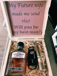 a bottle of whiskey in a wooden box with a message on the side that reads, my future wife made me send this will you be my best man?