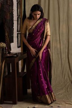 Magenta silk chanderi saree with floral butis and textured gold border. Comes with unstitched blouse fabric.
Component: 2
Embroidered
Fabric: Chanderi silk
Color: Purple
All over motifs saree
Note : The blouse worn by the model is not for sale. - Aza Fashions Magenta Wedding Saree, Purple Sari With Contrast Blouse, Brinjal Colour Saree, Magenta Saree Contrast Blouse, Muhurtham Saree, Dulhan Lehenga, Maharashtrian Bride, Saree Styling, Sarees Banarasi