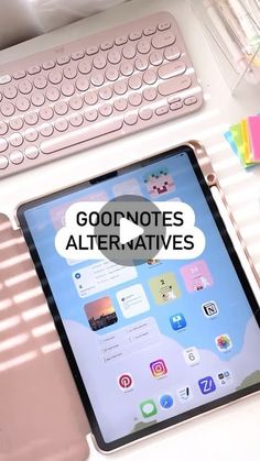 an ipad and keyboard on a desk with the words good notes alter natives above it