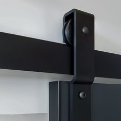 Cavity Sliders Barn Door Track at RealCraft - Hangers close up Barndoor Modern, Cavity Sliders, Exterior Sliding Barn Doors, Barn Door Track System, Exterior Door Hardware, Barn Door Installation, Black Hangers, Modern Sliding Doors, Barn Door Kit