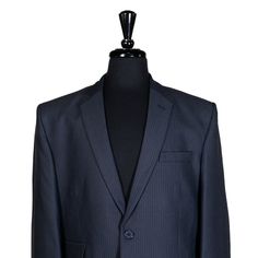 This Chiragh Apparel blazer is an elegant upgrade on dapper tailoring and features rich shades in a sumptuous fabric for elegant opulence. Fashioned from 100% premium quality cotton, this striped blazer features full lining in Japanese silk, a notch lapel, two-button closure and a single-vented back. A left chest pocket and three flap pockets appoint the front while the inside has two (2) pockets on the left and one (1) pocket on the right. A flash of contrast piping is added to the jacket linin Blue Business Tuxedo Outerwear, Navy Tuxedo Blazer With Suit Collar, Navy Tailored Tuxedo Blazer, Blue Tuxedo Style Formal Outerwear, Formal Blue Tuxedo Outerwear, Blue Formal Tuxedo Outerwear, Blue Semi-formal Outerwear In Suiting Fabric, Elegant Navy Blazer With Suit Collar, Elegant Navy Outerwear With Single Button