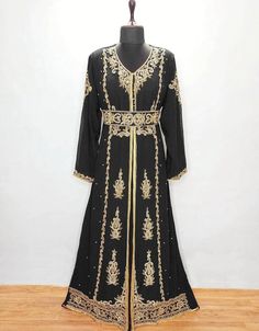 Mashallah! ❤️ Modest V neck Moroccan Style embroidered kaftan Black 👗 Order Online latest Embroidered Kaftan which are made up from best quality fabrics with latest styles from our large collections at https://bit.ly/3eafqPe Shop Now : https://bit.ly/35e17YL Buy online @ $109 #arabicshop #turkishcaftans #beautifulkaftans #arabickaftandresses #pakistanikaftan #middleeasternclothingnearme #traditionalarabicdress #cheapislamicclothing #turkishcaftan #arabicsuit #arabgown #kaftanparty Luxury Traditional Festive Thobe, Luxury Embroidered Evening Thobe, Luxury Dabka Work Floor-length Kaftan, Luxury Embroidered Floor-length Kaftan, Luxury Traditional Thobe With Dabka, Luxury Traditional Long Thobe, Luxury Long Thobe With Gold Embroidery, Luxury Long Ceremonial Thobe, Luxury Embroidered Gold Thobe