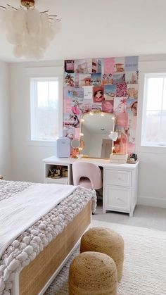 a bedroom with a bed, desk and mirror