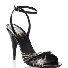 A Pair Of Woman’s Heels In A Black Leather With A Snake Skin Design And Chain Detailing. Size: 38 1/2, Fits True To Size Height: 4" Heel Material: Leather Upper, Lining And Sole Msrp: $1,195 Luxury Ankle Strap Heels For Night Out, Luxury Evening Sandals With 4-inch Heel, Leather High Heels For Evening, Designer Sandals With 4-inch Heel For Evening, Evening Sandals With 4-inch Heel, Luxury 4-inch Heels For Evening, Luxury High Heel Shoes For Night Out, Luxury Heels With Wrapped Heel For Night Out, Luxury High Heel For Night Out