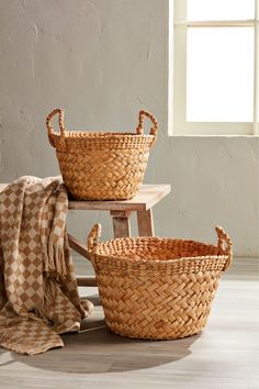 The Chunky Woven Basket Set includes two beautifully crafted baskets made from water hyacinth. These baskets are ideal for organizing and storing a variety of items in your home. The chunky woven design adds a rustic charm to any space, while the water hyacinth material ensures durability and strength. Basket Set, Water Hyacinth, Woven Basket, Woven Design, Mud Pie, Rustic Charm, Basket Weaving, Baskets, Pie