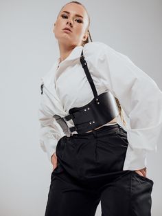 The model is wearing a size XL and is 33.5"/85 cm waist, 35"/89 cm underbust, 41.5"/106 cm bust.Can a belt be addictive to wear? According to our satisfied customer Kailus, the Moonson Belt most definitely can! Crafted with love and precision, this special leather belt can make even old outfits as good as new. Edgy Fitted Harness With Belt, Party Harness With Belt Loops In Black, Edgy Harness With Belt For Night Out, Edgy Belt Harness For Night Out, Black Party Harness With Belt Loops, Black Fitted Belt For Night Out, Chic Black Belts, Fitted Belt Harness For Cosplay, Fitted Harness With Belt For Cosplay