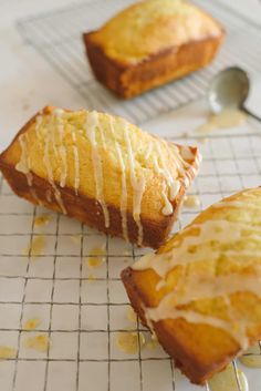 two pastries sitting on top of a cooling rack