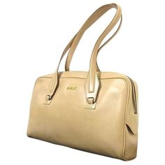 For Sale Is A Unique, Vintage, Gucci, Rare, Camel Leather, Two Handle, Satchel Style Purse With Gold Accents! It Is A Classic Style That Would Be A Great Used As A Signature, Everyday Purse! The Bag Is A Classic, Gucci, Purse! The Purse Is A Two Handle, Camel Leather Satchel Style. It Has Brass Hardware And A Zip Close Top. The Bag Has Minimal Wear To The Lining. It Has A Zip Top Closure With A One Compartment And A Zip Closure, Side Pocket. It Is Vintage And Pre-Owned, But Was Well Cared For And In, In My Opinion, Very Good Vintage Condition! There Is Minimal Wear To The Exterior- See Pictures. There Is Some Wear To The Leather, Ribbed Edges- See Pictures- Which Has Been Cleaned And Poli Vintage Satchel, Gucci Purse, Everyday Purse, Gucci Vintage, Leather Satchel, Zip Top, Side Pocket, Vintage Gucci, Gold Accents