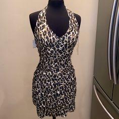 Charlotte Russe Cheetah Print Halter Dress Nwt Chic Fitted Tiger Print Dress, Fitted Tiger Print Dress For Night Out, Chic Tiger Print Party Dress, Chic Party Dress With Tiger Print, Chic Tiger Print Mini Dress For Party, Tiger Print Mini Dress For Party, Fitted Sleeveless Mini Dress With Tiger Print, Fitted Sleeveless Tiger Print Mini Dress, Fitted Tiger Print Mini Dress For Night Out