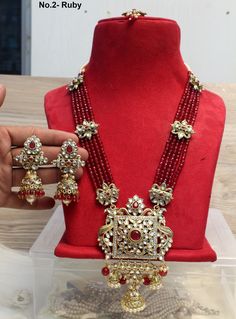 *Light Weight Gold Rani Haar Necklace Set. *No.1-  Gold  *Haar length: 14.50 inches (including pendant) *Pendant Breadth- 3 inches *Earrings length: 3.5 inches  (with drops) ;   *earrings Width: 1.5 inches *No.2- ruby maroon *Haar length: 14.50 inches (including pendant) *Pendant Breadth- 3 inches *Earrings length: 3.5 inches  (with drops) ;   *earrings Width: 1.5 inches *No.3- Green *Haar length: 14.50 inches (including pendant) *Pendant Breadth- 3 inches *Earrings length: 3.5 inches  (with dro Elegant Long Kundan Necklace For Puja, Intricate Design Kundan Long Necklace For Gift, Long Kundan Necklace With Intricate Design As A Gift, Kundan Necklaces For Eid Gifts, Bollywood Style Necklaces For Puja And Eid, Bollywood Style Necklace For Eid Puja, Eid Gift Kundan Necklaces, Long Kundan Necklace With Intricate Design For Celebration, Eid Kundan Necklace With Latkans As Gift