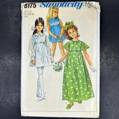 an old sewing pattern for girls'dresses