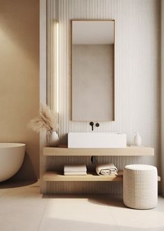 a bathroom with a sink, mirror and bathtub in the middle of the room