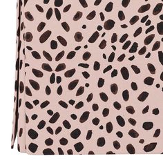 a pink and black animal print skirt with brown spots on the bottom, side view