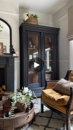 a living room filled with furniture and a fire place