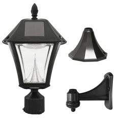 an outdoor light with two lights on each side and one lamp attached to the wall