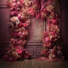 a room with flowers on the wall and a window in the center that is decorated with pink roses