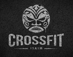 the crossfit logo is shown in white on black paper with an image of a man