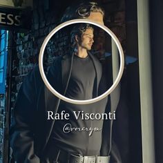 a man standing in front of a store window with the words raf visconti on it