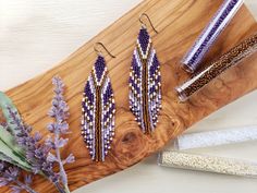 Inspired by the bright feathers of the Purple Grenadier, these earrings are handwoven. Made with quality Japanese (Toho) glass beads. Strong nylon beading thread. Beautiful contrasting coloring will add pop and sparkle to any outfit whether casual or formal. (Approximate size with ear wire: Length 10.5cm; Width 2.5cm) All earring hook options are hypoallergenic. Choice of: surgical grade Titanium, Niobium or 14k Gold-Filled. As someone who has struggled with very sensitive ears my whole life, I Beaded Feather Earrings, Nature Earrings, Sensitive Ears, Beaded Fringe, Seed Bead Bracelets, Feather Earrings, Fringe Earrings, Bead Jewellery