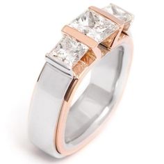 a white and rose gold ring with three princess cut diamonds on the sides, set in two tone gold