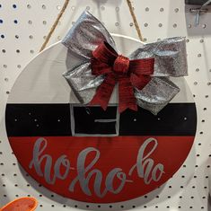 a sign that says ko - hoo with a bow on it