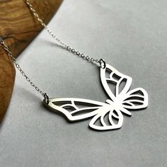 This Mothers Day Gift is the perfect way to show your mom how much you appreciate her. Sterling silver cut-out butterfly pendant with sterling silver oval cable chain. Cute and durable. The best choice for everyday use which is very comfortable and easy to wear. You have the option to choose your desired chain length.   D E T A I L S * pendant's width: 25 mm * pendant's height: 22 mm H O W ∙ TO ∙ O R D E R * step one: choose the chain's length * step two: add to cart   -------------------------- Stainless Steel Butterfly Necklace Gift, Elegant Laser Cut Jewelry For Gifts, Elegant Laser Cut Jewelry As A Gift, Elegant Laser Cut Jewelry Gift, Butterfly Shaped Stainless Steel Necklace For Gift, Silver Stainless Steel Butterfly Necklace As Gift, Silver Stainless Steel Butterfly Necklace Gift, Silver Butterfly Jewelry For Mother's Day, Mother's Day Silver Butterfly Jewelry