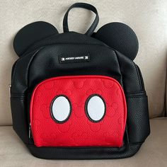 Perfect For You Or For A Mickey Mouse Fan. Casual Black Backpack For Disney Trips, Cute Mickey Mouse Bags For Travel, Black Mickey Mouse Backpack, Red Minnie Mouse Backpack For Disney Trips, Mickey Mouse Themed Backpack For Disney Trips, Mickey Mouse Standard Backpack For Disney Trips, Disney Red Minnie Mouse Backpack, Minnie Mouse Backpack For Disney Fan Events, Red Disney Minnie Mouse Backpack