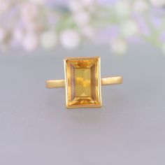 Emerald Cut Citrine ring, November Birthstone Jewelry, Statement Ring, Gold Promise Ring, Rectangle Ring, Engagement Ring Cocktail Gold Ring Ring Description: - Main Stone- Citrine Creation- Lab Created Stone size - 11x7MM Stone Color- Yellow Stone Shape - Emerald Cut Birthstone - November Check out my other items!   PAYMENTS   We accept PayPal, If we do not receive payments immediately we will hold the item only for one working day for your payments and we will be re-listing the item afterward. if there is difficulty in paying for the item/s you have bought immediately please contact us so we can hold your item. FEEDBACK Please contact us if you have any problem with the product before leaving negative feedback, opening a case, or a return request. we will try our very best to solve any p Rectangular Topaz Promise Ring, Rectangular Gold Birthstone Ring For Wedding, Yellow Rectangular Ring As A Gift, Rectangular Birthstone Ring As Gift, Gift Rectangular Birthstone Ring, Rectangular Birthstone Ring In Fine Jewelry Style, Rectangular Birthstone Rings Fine Jewelry, Fine Jewelry Rectangular Birthstone Rings, Rectangular Topaz Ring In Fine Jewelry Style