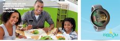 a couple of people sitting at a table with food