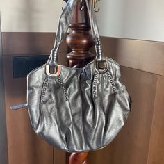 Like New Medium Sized Genuine Leather Pewter B Makowsky Bag. Used Only A Handful Of Times. Original Price Was 258.00, Marked Down To 154.00 At Nordstrom. Elegant Hobo Bag With Palladium Hardware For Shopping, Elegant Metallic Shoulder Bag With Palladium Hardware, Elegant Metallic Shoulder Bag For Everyday Use, Metallic Elegant Shoulder Bag For Everyday, Elegant Everyday Metallic Shoulder Bag, Evening Shoulder Bag With Palladium Hardware In Metallic Silver, Elegant Hobo Bag With Gunmetal Hardware For Evening, Elegant Leather Bags With Silver Accents, Metallic Silver Shoulder Bag With Palladium Hardware For Evening