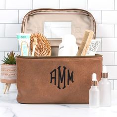 Keep your toiletries, cosmetic brushes and makeup secure while traveling with our personalized train case. Cosmetic Train Case, Christmas 2025, Marley Lilly, Train Case, Vanity Case, Travel In Style, It Cosmetics Brushes, Garden Tote, Personal Training