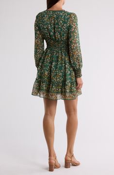 A smocked waist shapes the silhouette of this floral-patterned dress framed by long sleeves. 35 1/2" length V-neck Long sleeves with smocked cuffs Slips on over head Lined 100% polyester Machine wash, line dry Imported Model stats: 5'10" height, 32" bust, 25" waist, 36" hip. Model is wearing size Small. Fitted Long Sleeve Smocked Dress With Floral Print, Patterned Floral Print Long Sleeve Mini Dress, Vibrant Long Sleeve Mini Dress With Floral Print, Long Sleeve Semi-stitched Embroidered Floral Dress, Long Sleeve Multicolor Floral Mini Dress, Max Studio, Waist Dress, Dress Patterns, Smocking