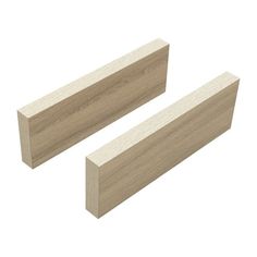 two pieces of wood sitting next to each other